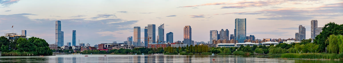 Changsha skyline and waterfront at dusk, Hunan, China